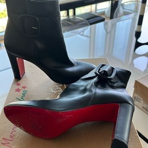Christian bouton boots about 3 inch heel